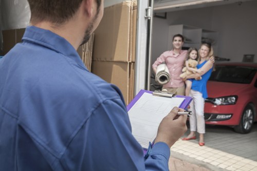 Removal van loading outside a Norbiton property