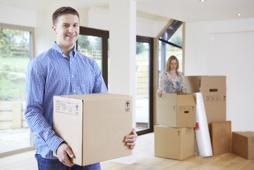 Relocating office equipment and desks with careful handling in Norbiton