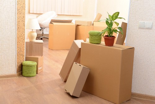 Packed household items ready for transport in Norbiton
